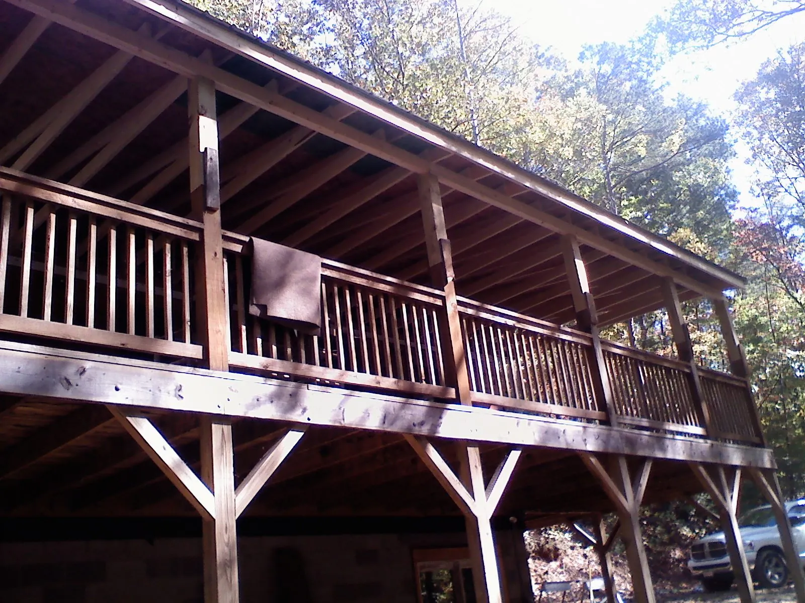 Timber framing under a new elevated porch and deck — Roof Leak Repair in Sangerfield by Roofing Brothers